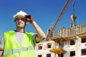 Builder on site with hard hat